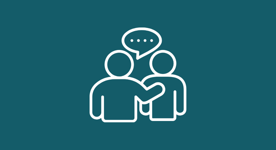 A person putting their arm on another person to offer support.