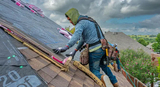 Roofing work being completed